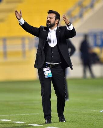 (180306) -- DOHA, March 6, 2018 -- Bulent Uygun, head coach of Al-Gharafa reacts during the AFC Champions League Group A soccer match between Qatar s Al-Gharafa and Saudi Arabia s Al Ahli at Thani bin Jassim Stadium in Doha, Capital of Qatar, March 5, 2018. The match ended with a 1-1 draw. ) (SP)QATAR-DOHA-SOCCER-AFC-AL GHARAFA VS AL AHLI Nikku 