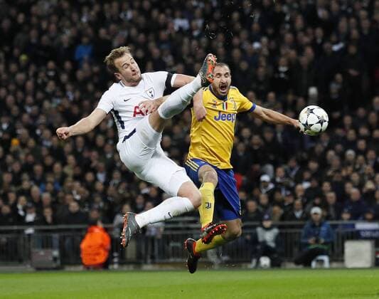 Tottenham s Harry Kane tussles with Juventus Giorgino Chiellini during the Champions League Round of 16 match at Wembley Stadium, London. Picture date: March 7th 2018. Picture credit should read: David Klein Sportimage EDITORIAL USE ONLY. No use with unauthorised audio, video, data, fixture lists, club league logos or live services. Online in-match use limited to 120 images, no video emulation. No use in betting, games or single club league player publications.