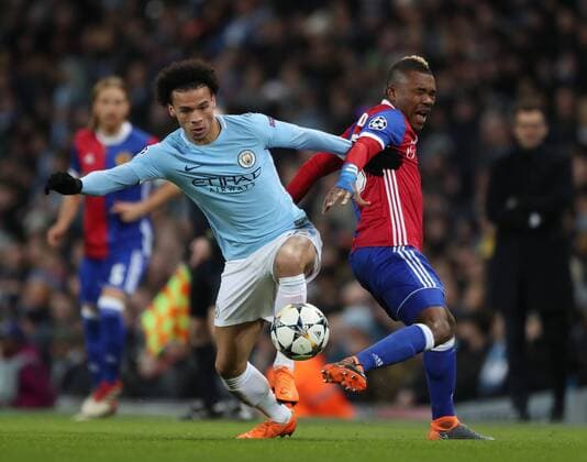 Leroy Sane of Manchester City tackles Serey Die of Basel during the Champions League Round of 16, 2nd Leg match at the Etihad Stadium, Manchester. Picture date: 7th March 2018. Picture credit should read: Simon Bellis Sportimage EDITORIAL USE ONLY. No use with unauthorised audio, video, data, fixture lists, club league logos or live services. Online in-match use limited to 120 images, no video emulation. No use in betting, games or single club league player publications.