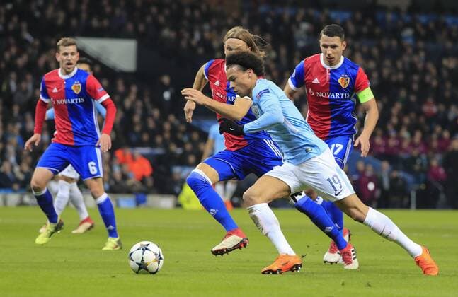 7th March 2018, Etihad Stadium, Manchester, England; UEFA Champions League football, round of 16, 2nd leg, Manchester City versus FC Basel; Leroy Sane of Manchester City runs past Michael Lang of Basel  ActionPlus11998980
