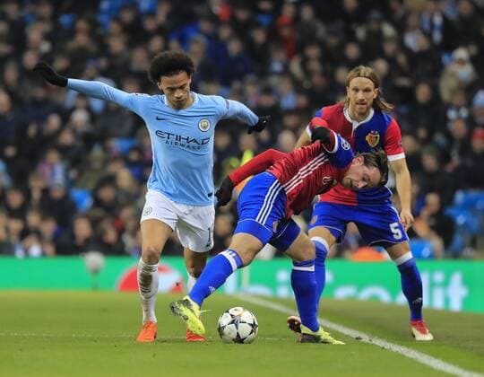 7th March 2018, Etihad Stadium, Manchester, England; UEFA Champions League football, round of 16, 2nd leg, Manchester City versus FC Basel; Leroy Sane of Manchester City is challenged by Luca Zuffi of Basel  ActionPlus11998982