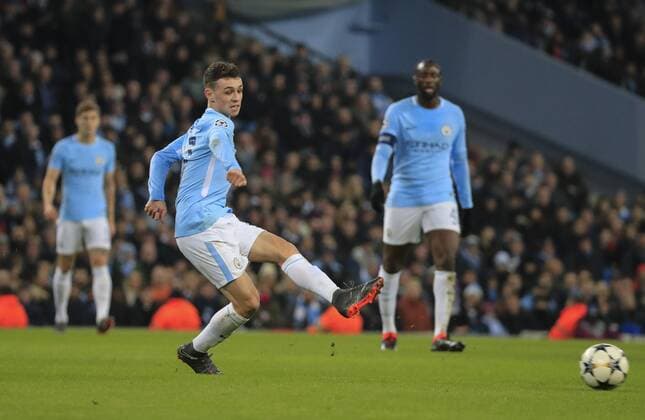 7th March 2018, Etihad Stadium, Manchester, England; UEFA Champions League football, round of 16, 2nd leg, Manchester City versus FC Basel; Phil Foden of Manchester City passes the ball out wide  ActionPlus11998983