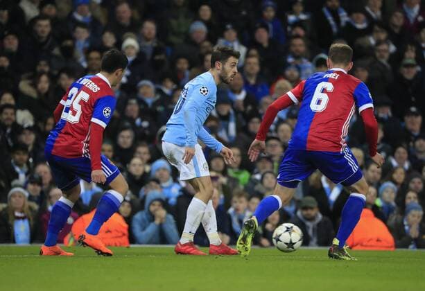 7th March 2018, Etihad Stadium, Manchester, England; UEFA Champions League football, round of 16, 2nd leg, Manchester City versus FC Basel; Bernardo Silva of Manchester City tries to get past Fabian Frei of Basel  ActionPlus11998986