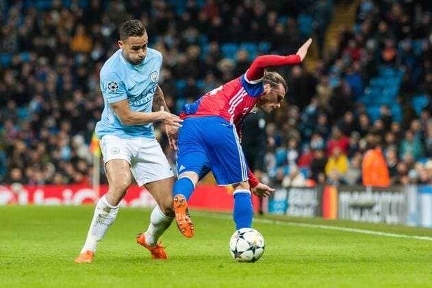 Manchester City v FC Basel UEFA Champions League Danilo of Manchester City in a tussle for the ball with Gabriel Jesus of Manchester City and during the UEFA Champions League match at the Etihad Stadium, Manchester Content Not Available For UK Newspapers Copyright: xMattxWilkinsonx FIL-11459-0047