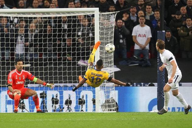 Tottenham Hotspur v Juventus UEFA Champions League Alex Sandro of Juventus clears the ball acrobatically during the UEFA Champions League match at Wembley Stadium, London Content Not Available For UK Newspapers Copyright: xPaulxChestertonx FIL-11460-0102