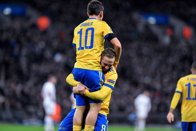 March 7, 2018 - London, United Kingdom - Paulo Dybala of Juventus celebrates with Gonzalo Higuainof Juventus scoring second goal during the UEFA Champions League match between Tottenham Hotspur and Juventus at Wembley Stadium, London, England on 7 March 2018. Tottenham v Juventus - UEFA Champions League  - ZUMAn230 20180307_zaa_n230_354 Copyright: xGiuseppexMaffiax