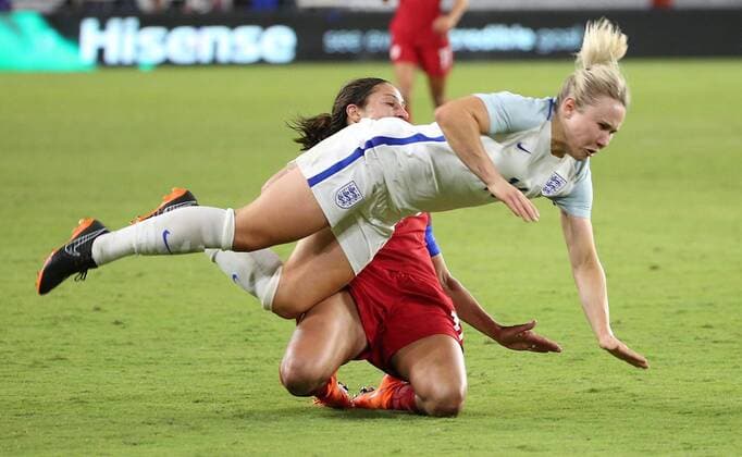 March 7, 2018 - Orlando, FL, USA - USA s Carli Lloyd, rear, knocks down England s Izzy Christiansen during the She Believes Cup at Orlando City Stadium on Wednesday, March 7, 2018, in Orlando, Fla. USA won, 1-0. USA vs. England women s soccer in Orlando - ZUMAm67_ 20180307_zaf_m67_030 Copyright: xStephenxM.xDowellx