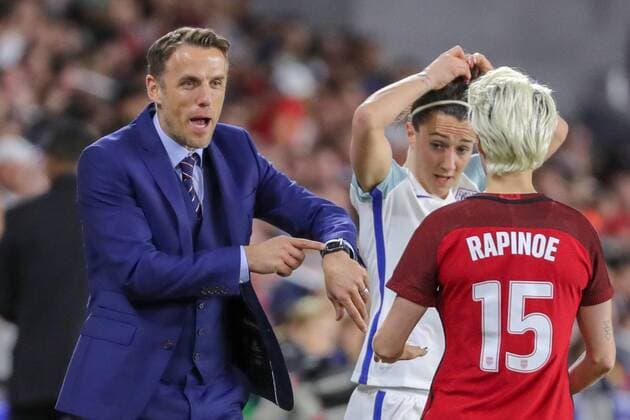 ORLANDO, FL - MARCH 07: England Head Coach Phil Neville talks with United States forward Megan Rapinoe (15) during the SheBelieves Cup soccer match between England and The United States on March 7, 2018 at Orlando City Stadium in Orlando FL. (Photo by Joe Petro Icon Sportswire) SOCCER: MAR 07 SheBelieves Cup - USA v England Icon20180307989 EDITORIAL USE ONLY