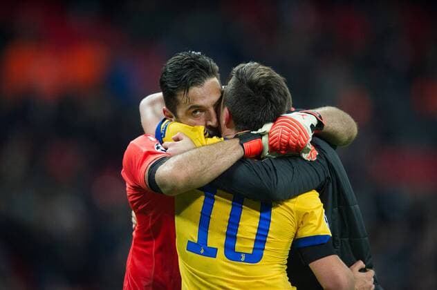 Juventus Gianluigi Buffon and Paulo Dybala celebrating after the UEFA Champions League match between Tottenham Hotspur and Juventus at Wembley Stadium, London, England on 7 March 2018. Copyright: xAndrewxAleksiejczukx PMI-1869-0035