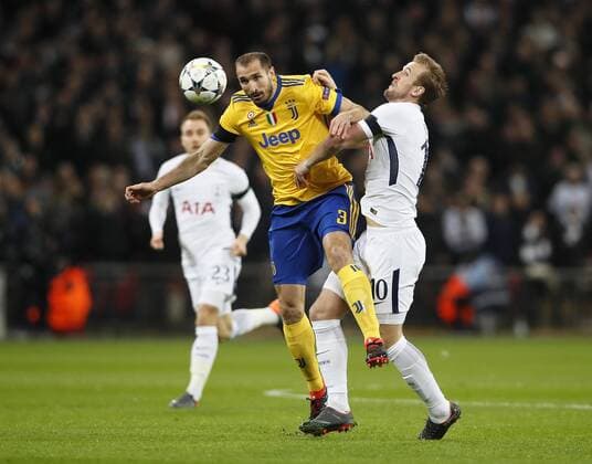 Tottenham s Harry Kane tussles with Juventus Giorgio Chiellini during the Champions League Round of 16 match at Wembley Stadium, London. Picture date: March 7th 2018. Picture credit should read: David Klein Sportimage EDITORIAL USE ONLY. No use with unauthorised audio, video, data, fixture lists, club league logos or live services. Online in-match use limited to 120 images, no video emulation. No use in betting, games or single club league player publications.