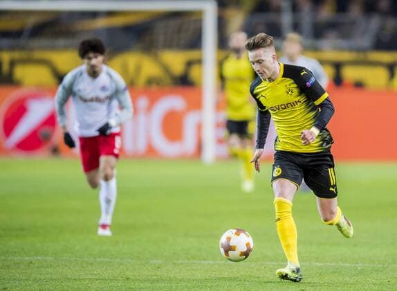 Fußball: UEFA Europa League, EL, Saison 2017 2018, Achtelfinale, Borussia Dortmund - RB Salzburg in Dortmund (Nordrhein-Westfalen). Dortmunds Marco Reus läuft mit dem Ball am Fuß. Copyright: xKirchner DavidxInderliedx