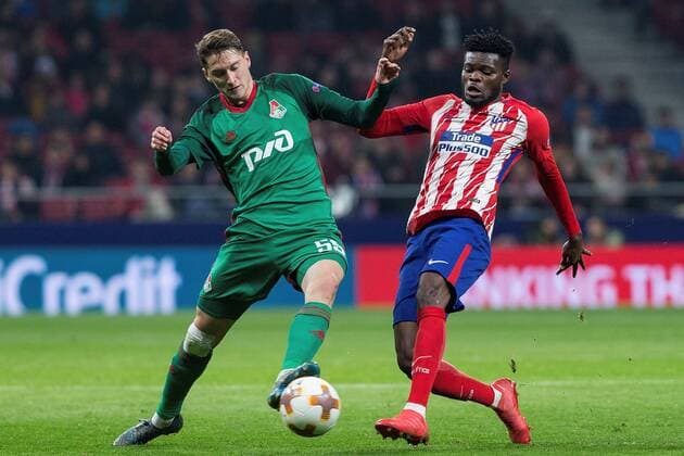 Atletico de Madrid s Thomas Partey (R) vies for the ball with Lokomotiv s Aleksei Miranchuk during the UEFA Europa League round of 16 first leg match bewteeen Atletico Madrid and Lokomotiv at the Wanda Metropolitano stadium in Madrid, Spain, 08 March 2018. Atletico Madrid vs. Lokomotiv !ACHTUNG: NUR REDAKTIONELLE NUTZUNG!  Copyright: xRodrigoxJimenezx MAD015 20180308-636561410302248039