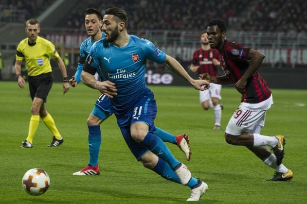 8th March 2018, San Siro, Milan, Italy; UEFA Europa League football, round of 16, 1st leg, AC Milan versus Arsenal FC; Sead Kolasinac of Arsenal turns out of trouble with the ball  ActionPlus11999347