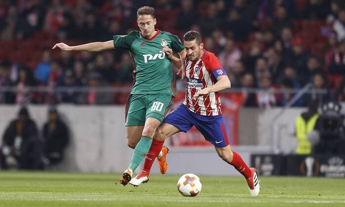 Partido de ida de octavos de Europa League entre el Atletico y el Lokomotiv. En la imagen, Miranchuck y Koke.Europa League 1 16 first leg match between Atletico and Lokomotiv. In this picture, Miranchuck and Koke. 