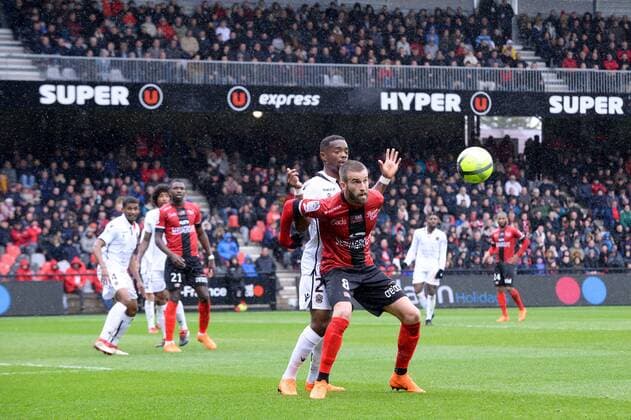 08 LUCAS DEAUX (gui) - 25 Wylan CYPRIEN (nice) FOOTBALL : Guingamp vs Nice - Ligue 1 Conforama - 11 03 2018 FEP Panoramic 