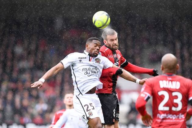 08 LUCAS DEAUX (gui) - 25 Wylan CYPRIEN (nice) - PLUIE FOOTBALL : Guingamp vs Nice - Ligue 1 Conforama - 11 03 2018 FEP Panoramic 