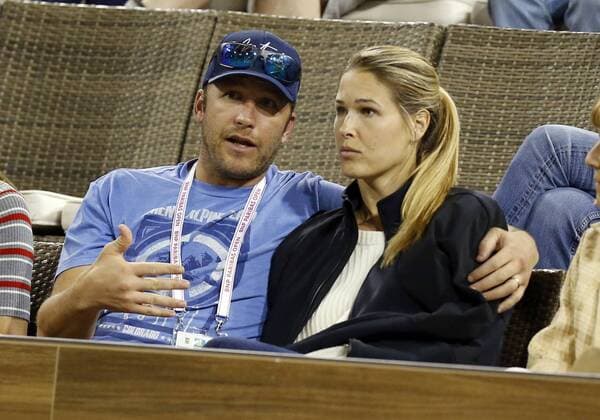 INDIAN WELLS, CA - MARCH 10: Alpine skier Bode Miller and Morgan Beck views a second round match between Roger Federer and Federico Debonis at the BNP Paribas Open on March 10, 2018, at the Indian Wells Tennis Gardens in Indian Wells, CA. (Photo by Adam Davis Icon Sportswire) TENNIS: MAR 10 BNP Paribas Open Icon1803102421 EDITORIAL USE ONLY