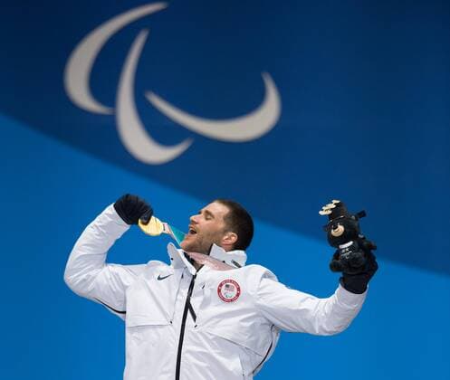 March 12, 2018 - Pyeongchang, South Korea - Gold medalist Mike Schultz of the US celebrates during a medal ceremony for Men s Snowboard Cross Monday, March 12, 2018 at the Medals Plaza for the 2018 Pyeongchang Winter Paralympic Games. Paralympics PyeongChang 18: Snowboard - ZUMAr157 20180312_zap_r157_042 Copyright: xMarkxReisx