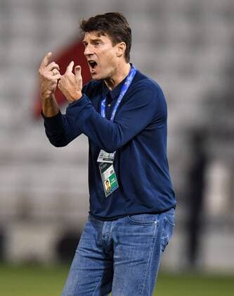 (180313) -- DOHA, March 13, 2018 -- Al-Rayyan s head coach Michael Laudrup reacts during the AFC Champions League Group D soccer match between Qatar s Al-Rayyan and Saudi Arabia s Al-Hilal FC at Jassim Bin Hamad Stadium in Doha, capital of Qatar, March 12, 2018. Qatar s Al-Rayyan won 2-1. ) (SP)QATAR-DOHA-SOCCER-AFC CHAMPIONS-GROUP D Nikku 