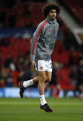 Marouane Fellaini of Manchester United ManU warms up before the Champions League Round of 16 match at Old Trafford Stadium, Manchester. Picture date: March 13th 2018. Picture credit should read: Andrew Yates Sportimage EDITORIAL USE ONLY. No use with unauthorised audio, video, data, fixture lists, club league logos or live services. Online in-match use limited to 120 images, no video emulation. No use in betting, games or single club league player publications.