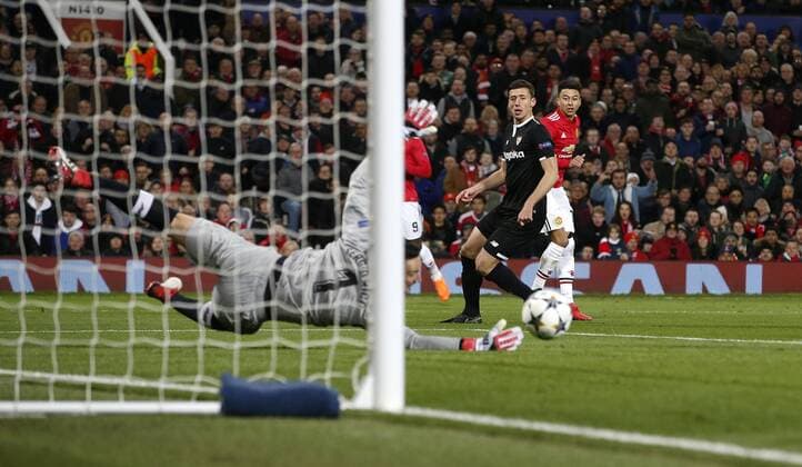 Sergio Rico of Sevilla saves from Jesse Lingard of Manchester United ManU during the Champions League Round of 16 match at Old Trafford Stadium, Manchester. Picture date: March 13th 2018. Picture credit should read: Andrew Yates Sportimage EDITORIAL USE ONLY. No use with unauthorised audio, video, data, fixture lists, club league logos or live services. Online in-match use limited to 120 images, no video emulation. No use in betting, games or single club league player publications.