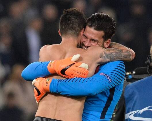 March 13, 2018 - Rome, Italy - Alisson Becker celebrates with Diego Perotti after the Champions League football match A.S. Roma vs Shakhtar Donetsk at the Olympic Stadium in Rome, on march 13, 2018. AS Roma v Shakhtar Donetsk - UEFA Champions League Round of 16: Second Leg  - ZUMAn230 20180313_zaa_n230_474 Copyright: xSilviaxLorex