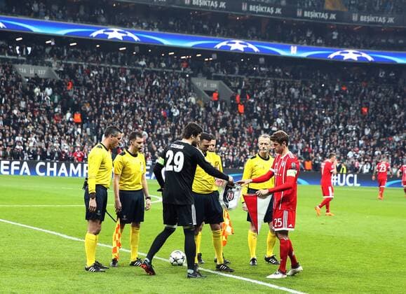 Goalkeeper Tolga Zengin of Besiktas and ThoÄ±mas Muller of Bayern Munchen during the Champions league second leg match between Besiktas and Bayern Munchen at Vodafone Park in Istanbul , Turkey on March 14 , 2018. 