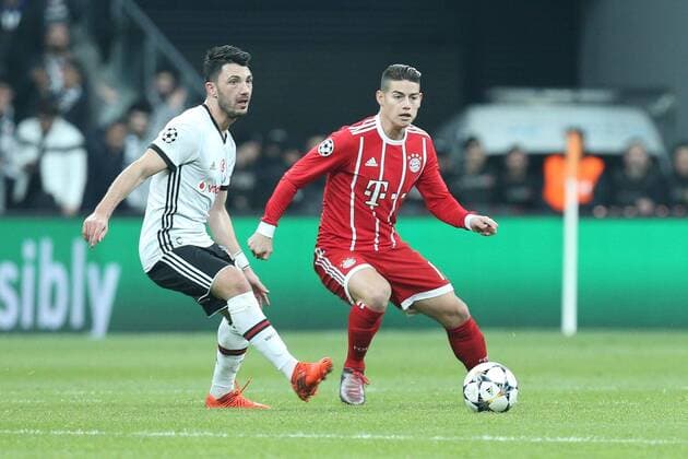 l-r: im Zweikampf, Aktion, mit Tolgay Arslan 18 (Besiktas Istanbul) und James Rodriguez 11 (FC Bayern Muenchen) , Besiktas Istanbul vs. FC Bayern Muenchen, Fussball, Achtelfinale, Champions League, 14.03.2018 Istanbul Istanbul Tuerkei