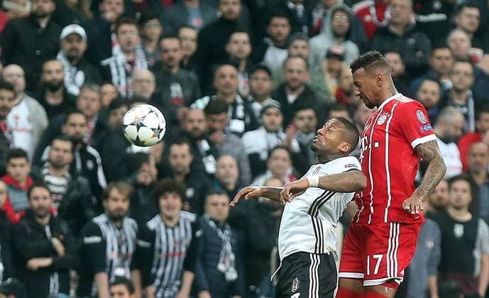 Bayern Munich™s Jerome Boateng and Besiktas Jermaine Lens during Besiktas - Bayern Munich UEFA Champions League round of 16 second leg soccer match in Vodafone Arena, Istanbul, Turkey, Mar 14, 2018.  Copyright: TolgaxAdanali 15949877