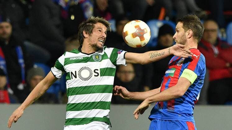 Fabio Coentrao of Sporting, left, and Marek Bakos of Viktoria in action during the second leg of the quarterfinal match of the Europe League in Pilsen, Czech Republic, March 15, 2018. (CTKxPhoto MichalxKamaryt) CTKPhotoP201803151092801  _KMT0335