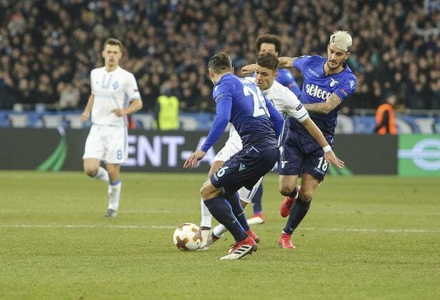 March 15, 2018 - Kiev, Ukraine - Dunamo Kyiv FC s Junior Moraes fight for a ball with S.S. Lazio FC s player Stefan Radu and S.S. Lazio FC s player Luis Alberto during the 2nd leg of Round 16 UEFA Europa League match at a NSC Olimpiyskyi in Kyiv, Ukraine, March 15, 2018. Dynamo Kiev v Lazio - UEFA Europa League Round of 16: Second Leg  - ZUMAn230 20180315_zaa_n230_348 Copyright: xSergiixKharchenkox