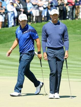 Matsuyama, Woods Hideki Matsuyama (L) and Tiger Woods play together during the first round of the Arnold Palmer Invitational at the Bay Hill Club and Lodge on March 15, 2018, in Orlando, Florida. 