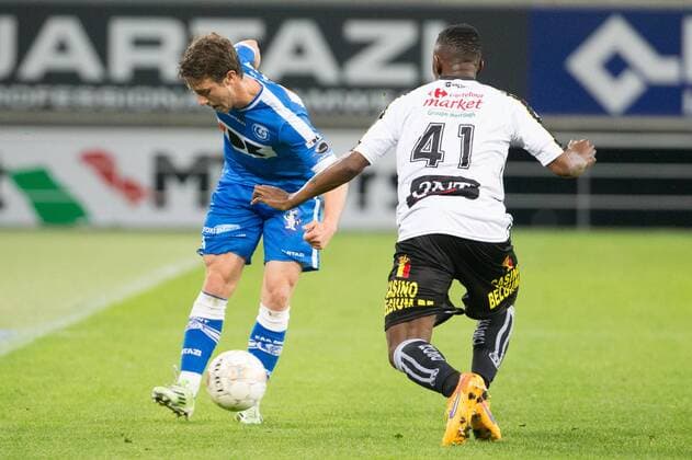 - GENT, BELGIUM: Gent s Brecht Dejaegere and Charleroi s Francis N Ganga fight for the ball during the Jupiler Pro League match between KAA Gent and Sporting Charleroi, Friday 08 May 2015 in Gent, on the seventh day of the Play-off 1. KURTxDESPLENTER x80804236x