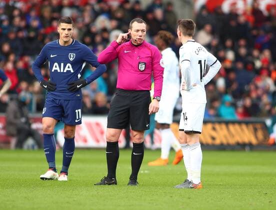 17th March 2018, Liberty Stadium, Swansea, Wales; FA Cup football, quarter-final, Swansea City versus Tottenham Hotspur; Referee Kevin Friend checks with VAR after Son Heung-Min of Tottenham Hotspur goal was ruled out on the pitch for offside  ActionPlus12002283
