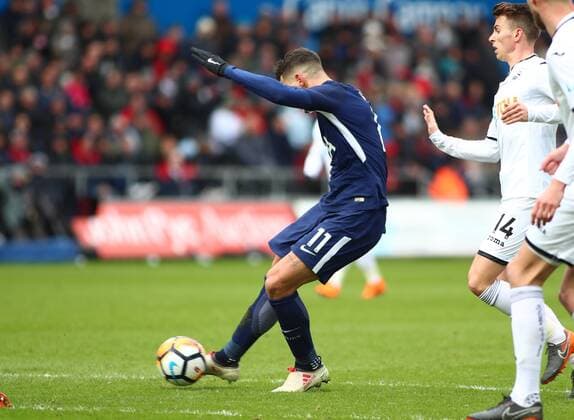 17th March 2018, Liberty Stadium, Swansea, Wales; FA Cup football, quarter-final, Swansea City versus Tottenham Hotspur; Erik Lamela of Tottenham Hotspur strikes the ball towards goal to score his sides 2nd goal of the 1st half making it 0-2  ActionPlus12002289