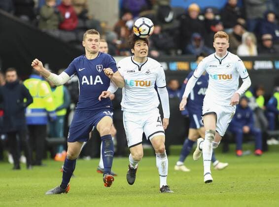 17th March 2018, Liberty Stadium, Swansea, Wales; FA Cup football, quarter-final, Swansea City versus Tottenham Hotspur; Ki Sung-Yueng of Swansea City and Eric Dier of Tottenham Hotspur challenge for possession  ActionPlus12002298