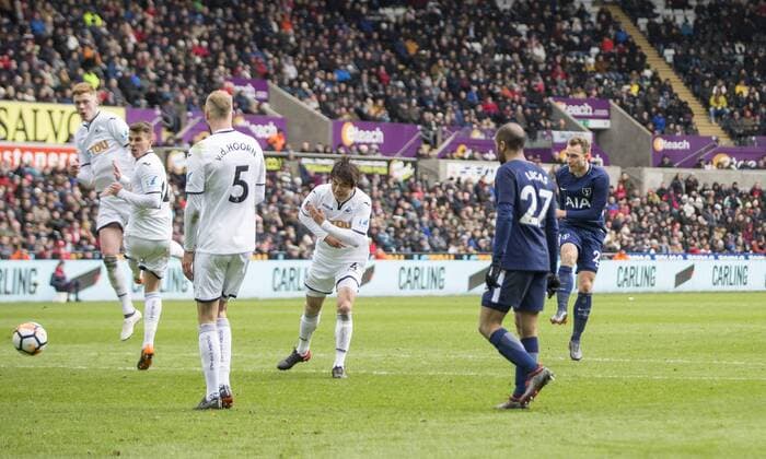 Christian Eriksen of Tottenham Hotspur scores his side s third goal during the FA Cup Quarter Final match between Swansea City and Tottenham Hotspur at the Liberty Stadium, Swansea, Wales on 17 March 2018. Copyright: xMarkxxHawkinsx PMI-1893-0042