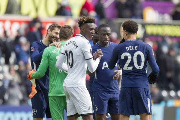 Tammy Abraham of Swansea City speaks with Dele Alli of Tottenham Hotspur at full time of the FA Cup Quarter Final match between Swansea City and Tottenham Hotspur at the Liberty Stadium, Swansea, Wales on 17 March 2018. Copyright: xMarkxxHawkinsx PMI-1893-0076