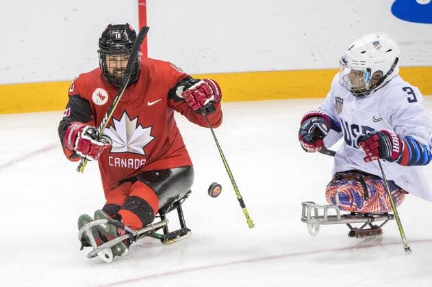 March 26, 2018 - Pyeongchang, South Korea - Billy BRIDGES (CAN) and Ralph DEQUEBEC (USA) during The Ice hockey Eishockey gold medal game between Canada and United States during day nine of the PyeongChang 2018 Paralympic Games on March 18, 2018 in Gangneung, South Korea. USA v Canada - Paralympic Games - Ice Hockey gold medal match  - ZUMAn230 20180326_zaa_n230_060 Copyright: xMauroxUjettox