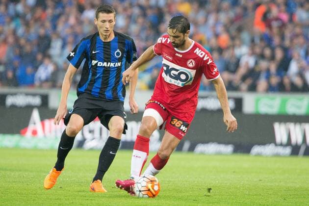 - BRUGGE, BELGIUM: Club s Hans Vanaken and Kortrijk s Benoit Poulain pictured in action during the Jupiler Pro League match between Club Brugge KV and KV Kortrijk, in Brugge, Friday 14 August 2015, on the 4rth day of the Belgian soccer championship. KURTxDESPLENTER x84040935x