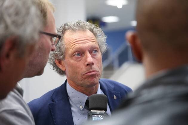 - MANCHESTER, UNITED KINGDOM: Club s head coach Michel Preud homme talks to the press during the arrival of Club Brugge, at Manchester Airport, England, Monday 17 August 2015. Belgian first league soccer team Club Brugge will play tomorrow the first leg game of the play-offs of the Uefa Champions League competition against British soccer club Manchester United ManU BRUNOxFAHY x84278922x