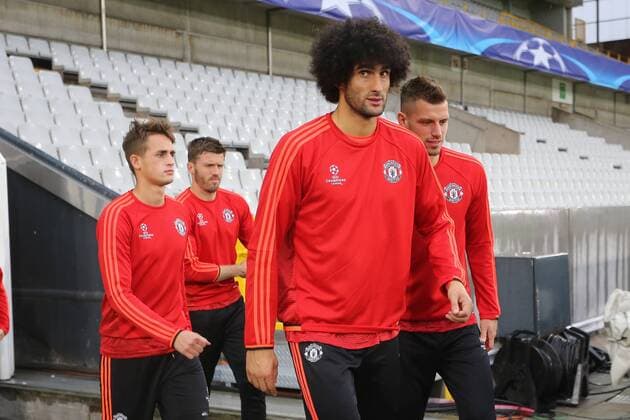 - BRUGGE, BELGIUM: Manchester s Adnan Januzaj and Manchester s Marouane Fellaini arrive for a training session of British soccer club Manchester United ManU in Brugge, Tuesday 25 August 2015. Tomorrow Belgian first league soccer team Club Brugge will play the return game of the play-offs of the Uefa Champions League competition against British soccer club Manchester United FC. Manchester United won the first leg 3-1. BRUNOxFAHY  x84611100x