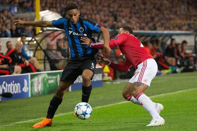 - BRUGGE, BELGIUM: Club s Jean-Charles Castelletto and Manchester s Memphis Depay fight for the ball during a soccer game between Belgian first league team Club Brugge KV and British club Manchester United ManU FC in Brugge, Wednesday 26 August 2015, the return game of the play-offs of the UEFA Champions League competition. Manchester United won the first leg 3-1. KURTxDESPLENTER x84637859x