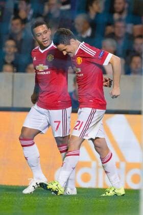 - BRUGGE, BELGIUM: Manchester s Ander Herrera (R) celebrates with his teammate Memphis Depay after scoring during a soccer game between Belgian first league team Club Brugge KV and British club Manchester United ManU FC in Brugge, Wednesday 26 August 2015, the return game of the play-offs of the UEFA Champions League competition. Manchester United won the first leg 3-1. KURTxDESPLENTER x84639105x