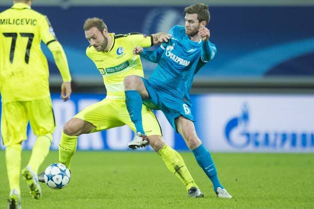 - GENT, BELGIUM: Gent s Laurent Depoitre and Zenit s Nicolas Lombaerts fight for the ball during a soccer game between Belgian team KAA Gent and Russian club FC Zenit Saint Petersburg, Wednesday 09 December 2015, in Gent, the sixth and last day of the group stage the UEFA Champions League competition, in group H. JASPERxJACOBS x88058469x