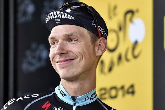 - MULHOUSE, FRANCE: German Tony Martin of team Omega Pharma - Quick Step celebrates on the podium with a special limited edition hat after winning stage 9 of the 101st edition of the Tour de France cycling race, 170 km from Gerardmer to Mulhouse, on Sunday 13 July 2014, in France. DAVIDxSTOCKMAN  x60247635x