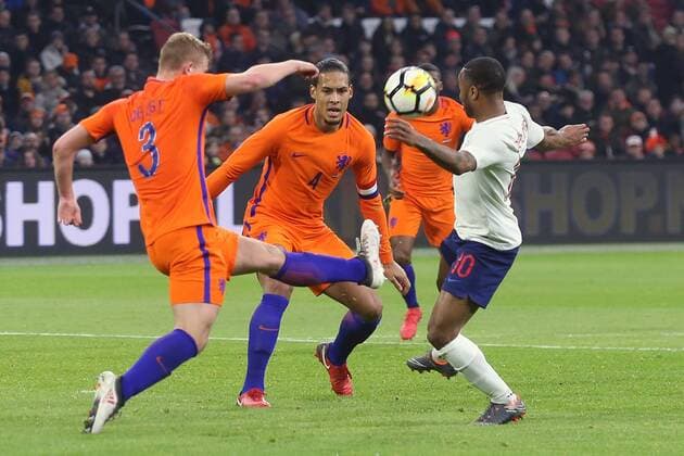 Netherlands v England International Friendly L?nderspiel Matthijs de Ligt of Netherlands and Raheem Sterling of England in action during the International Friendly match at Amsterdam Arena, Amsterdam Content Not Available For UK Newspapers Copyright: xPaulxChestertonx FIL-11538-0040