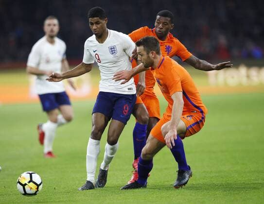 Netherland s Georgino Wijnaldum tussles with England s Marcus Rashford during the International Friendly Länderspiel match at the Amsterdam Arena, Amsterdam. Picture date: March 23rd 2018. Picture credit should read: David Klein Sportimage EDITORIAL USE ONLY. No use with unauthorised audio, video, data, fixture lists, club league logos or live services. Online in-match use limited to 120 images, no video emulation. No use in betting, games or single club league player publications.