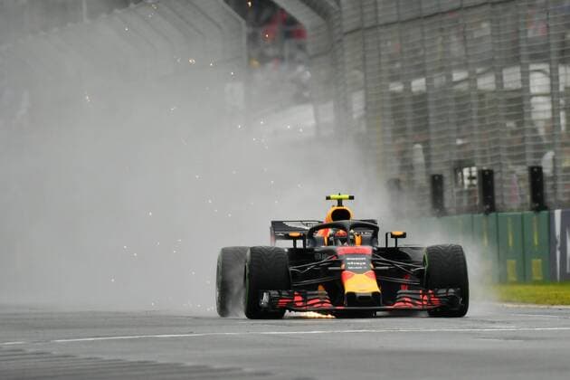 March 24, 2018: Max Verstappen (NLD) 33 from the Aston Martin Red Bull Racing team creates a rooster tail down the main straight during practice session three at the 2018 Australian Formula One Grand Prix at Albert Park, Melbourne, Australia. Cal Media Formula One 2018: Australia - Qualifying and Practice 3 - ZUMAc04_ 20180324_zaf_c04_002 Copyright: xSydneyxLowx