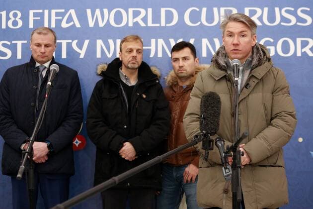 NIZHNY NOVGOROD, RUSSIA - MARCH 24, 2018: Russia 2018 Local Organizing Committee CEO Alexei Sorokin (front), Nizhny Novgorod Deputy Governor Dmitry Svatkovsky and FIFA Director of Competitions Colin Smith (L-R background) visit Nizhny Novgorod Stadium, a venue of the 2018 FIFA World Cup WM Weltmeisterschaft Fussball in Russia. Mikhail Solunin TASS  TS079293
